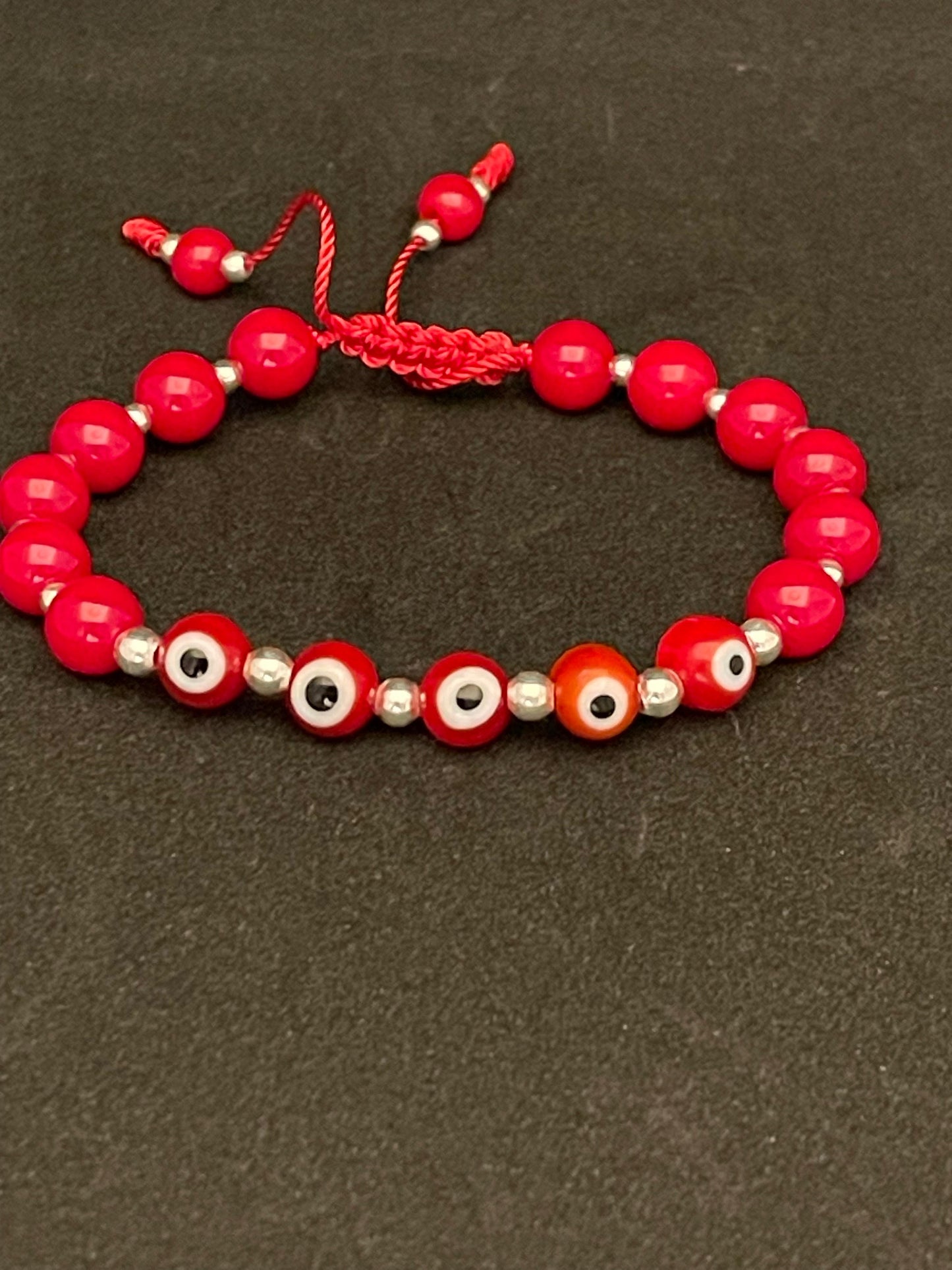 PULSERA con 5 ojitos con plata