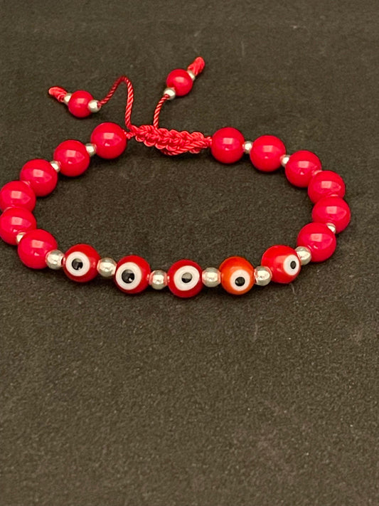 PULSERA con 5 ojitos con plata